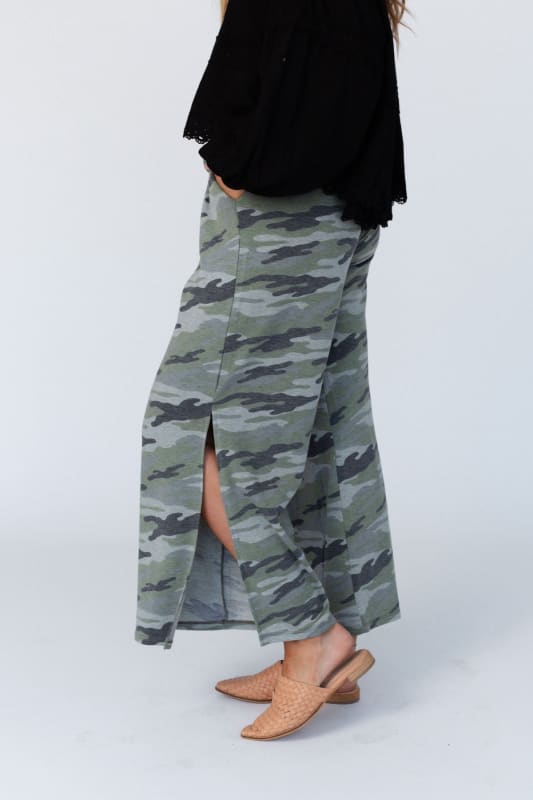 side view of The Nest Casual Wanderer Wide Leg Slit Pants in Army Green Charcoal Camo