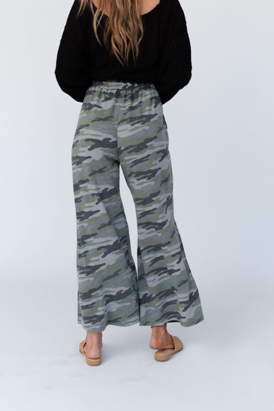 back view of The Nest Casual Wanderer Wide Leg Slit Pants in Army Green Charcoal Camo