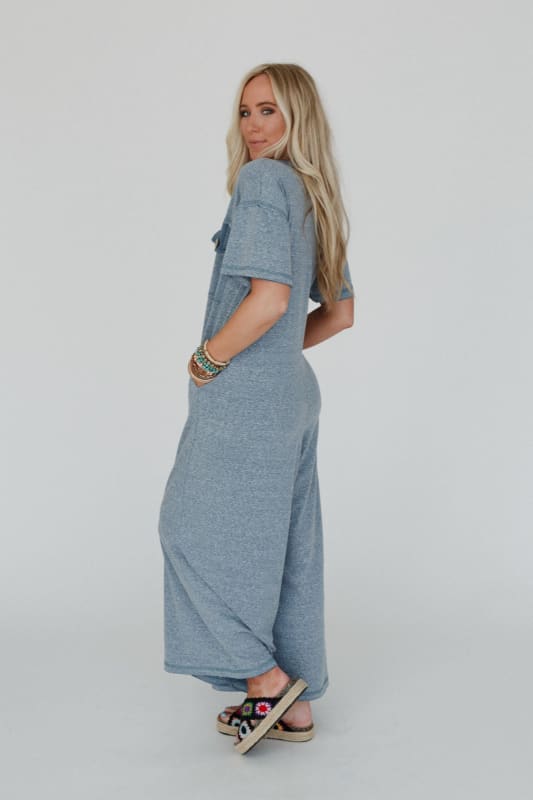 side view of Jodi Short Sleeve Boho Jumpsuit in Blue from Three Bird Nest
