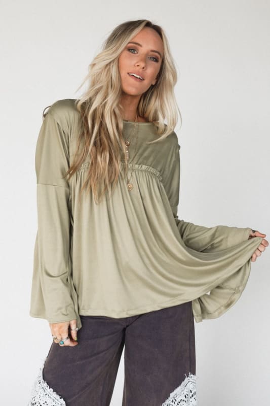 The Nest Solid Serenity Long Sleeve Babydoll Top in Olive from Three Bird Nest