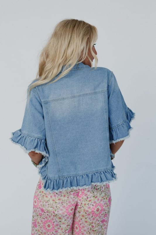 back view of Scottie Ruffle Denim Jacket in Light Denim from Three Bird Nest